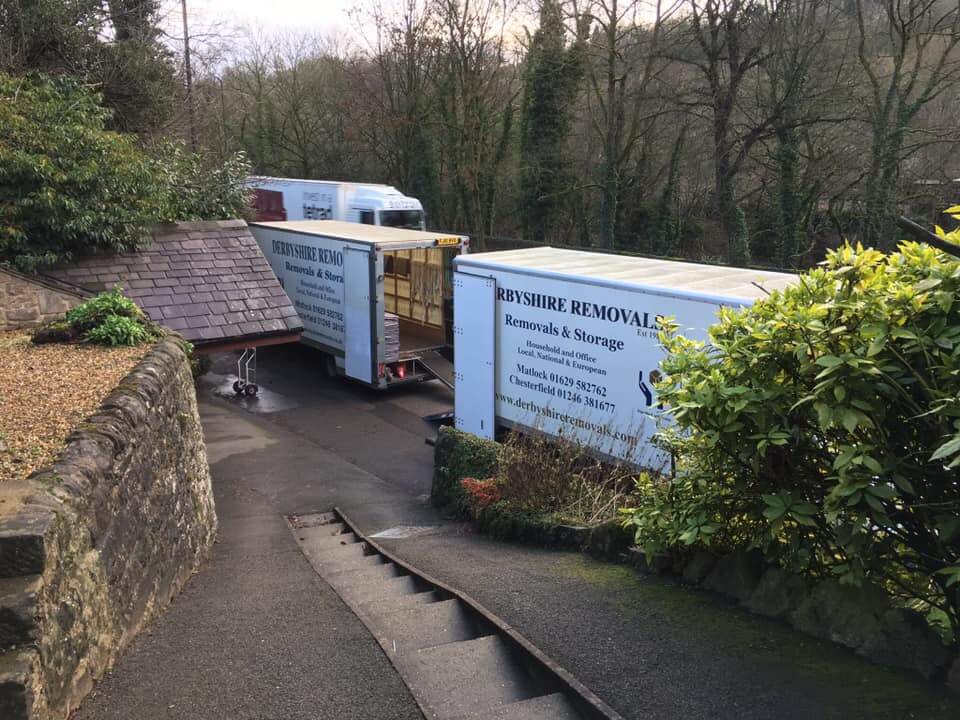 Derbyshire house removals service - movers preparing protected furniture for safe transport